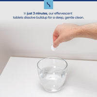 Snugell CPAP Cleaning Tablets dissolving in water, creating a powerful yet gentle solution to remove dirt, oils, and residues from CPAP accessories.