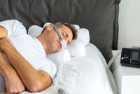 Person sleeping comfortably while using Snugell CPAP Hose (6 ft) – flexible and durable tubing for uninterrupted CPAP therapy and improved sleep quality.