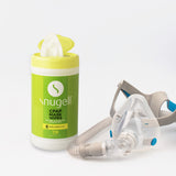 Individual canister of the  Citrus CPAP Mask Wipes by Snugell next to a CPAP mask