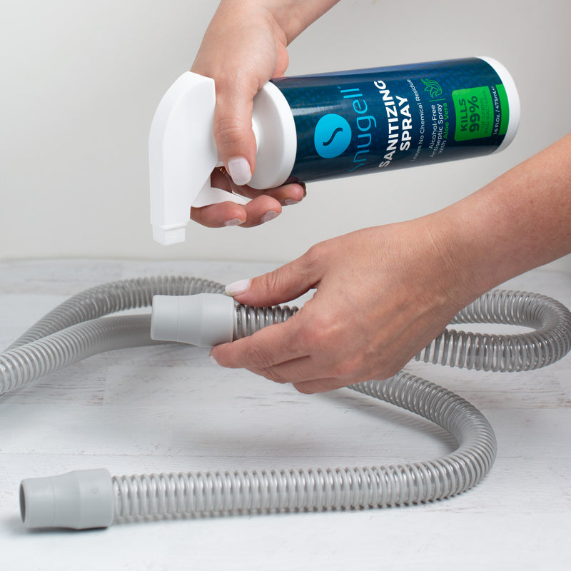 CPAP Sanitizing spray by Snugell being used to sanitize CPAP tube