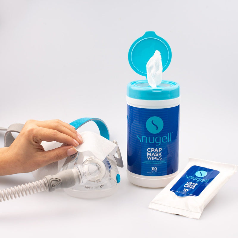 CPAP Mask Wipes Travel Sachets by Snugell alongside the regular canister and a mask