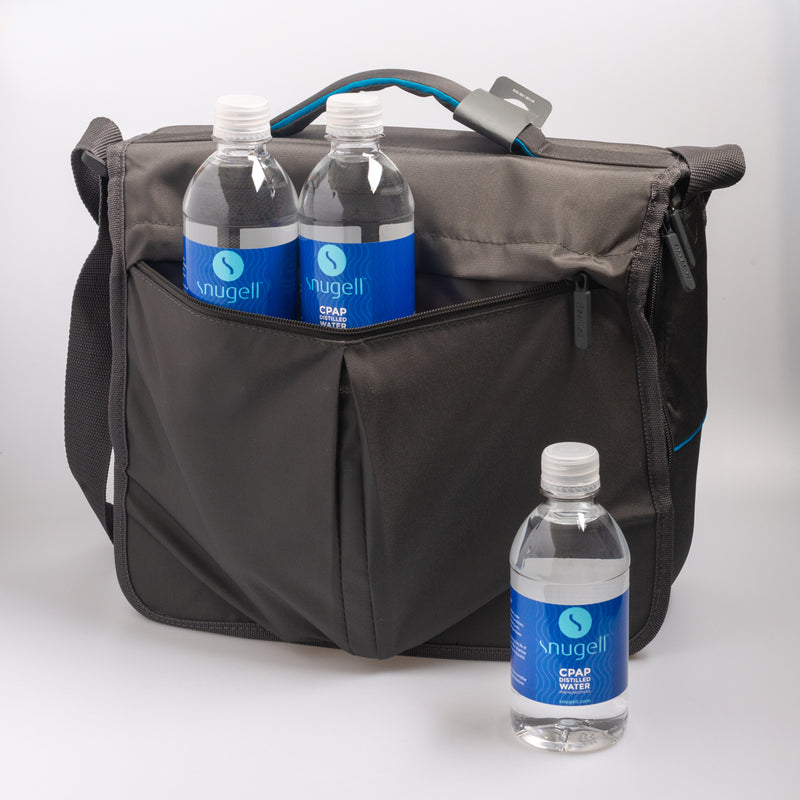 Display showing the 12oz distilled water by Snugell while traveling ease